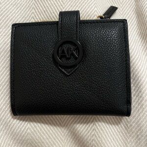 Anne Klein women’s pebble black bi-fold wallet with gold zipper